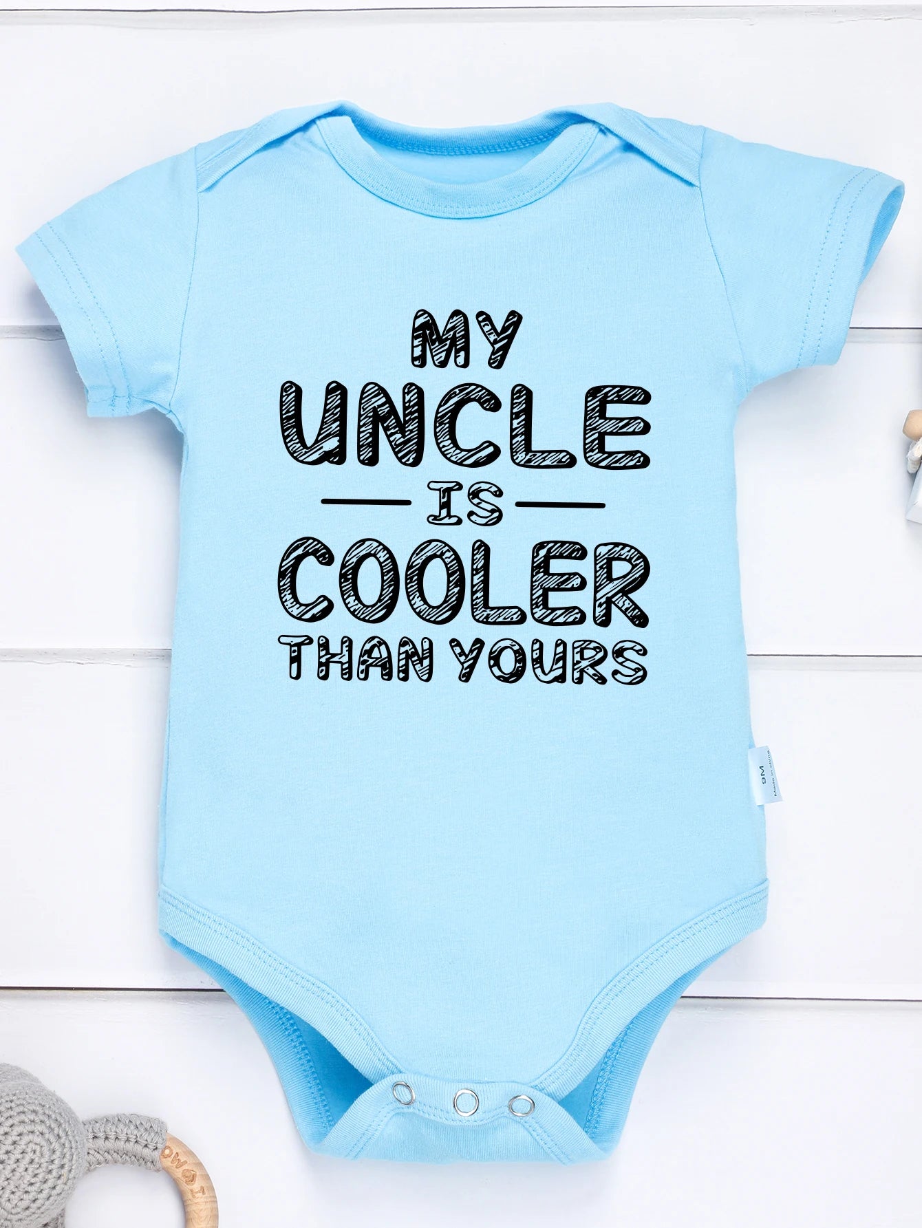 Fun and Trendy “My Uncle is Cooler Than Yours” Baby Onesie – Kidstors